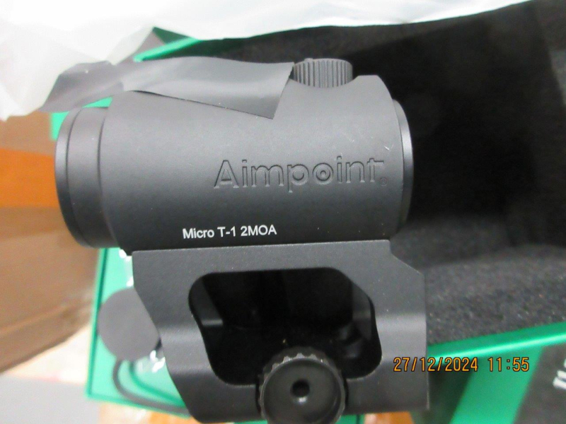 Optiskais tēmeklis “Aimpoint” tuvplānā  